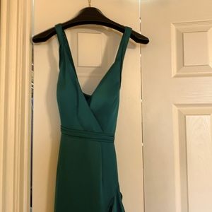Emerald green Aiden Maddox cocktail gown.